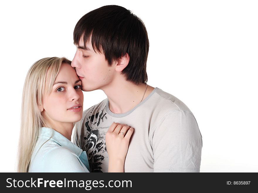 Young loving couple isolated at white background