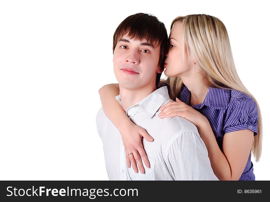 Young loving couple isolated at white background