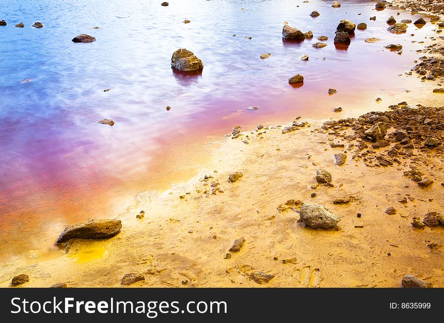 Colorful lake shore in a desert