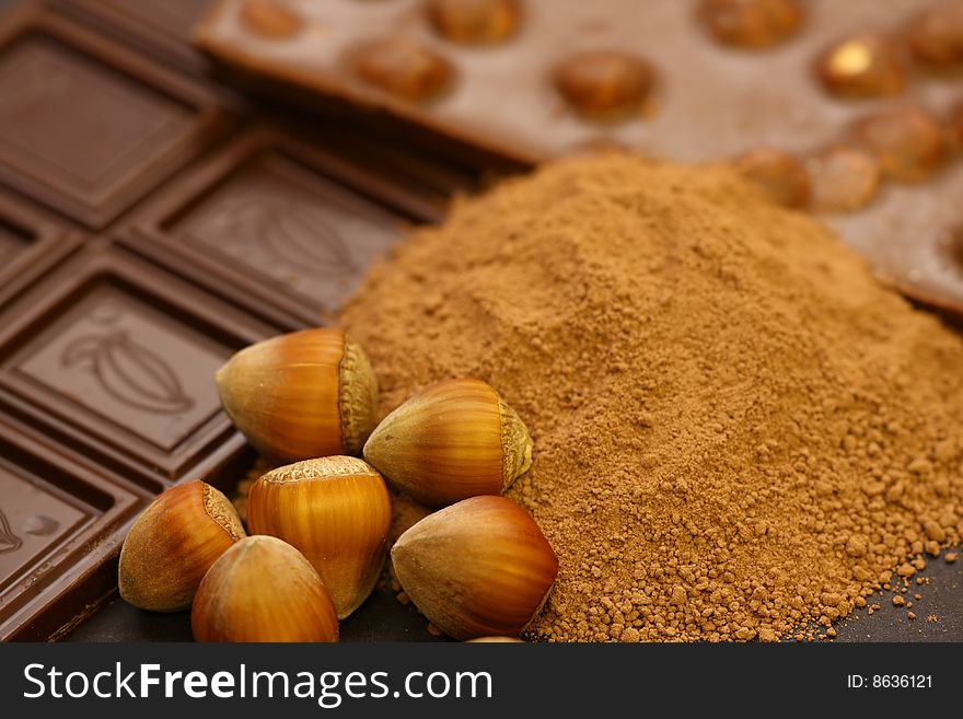 Detail of chocolate and peanuts on black background