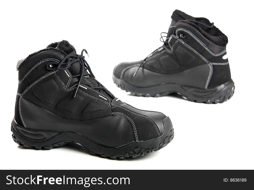 Two Black Men S Winter Boots On White