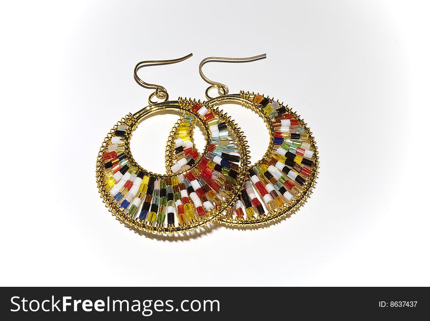 The colorful ear-ring with various gems