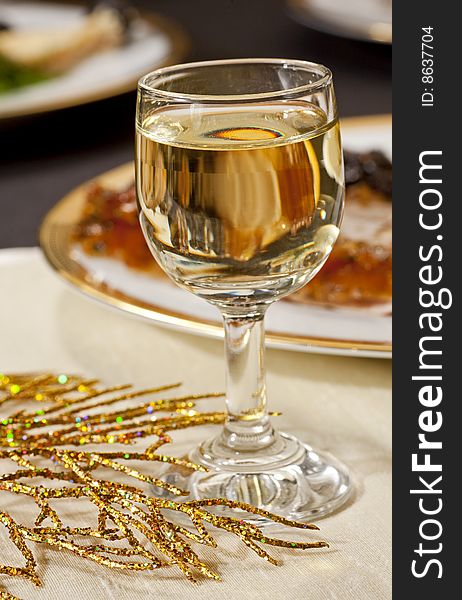 Glass of white wine on blur background. Glass of white wine on blur background