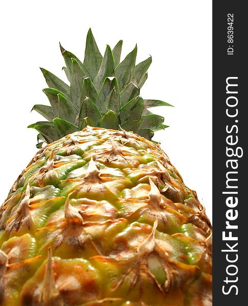 A ripe pineapple isolated on white