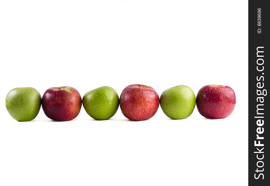 Six red and green apples on a white background. Six red and green apples on a white background