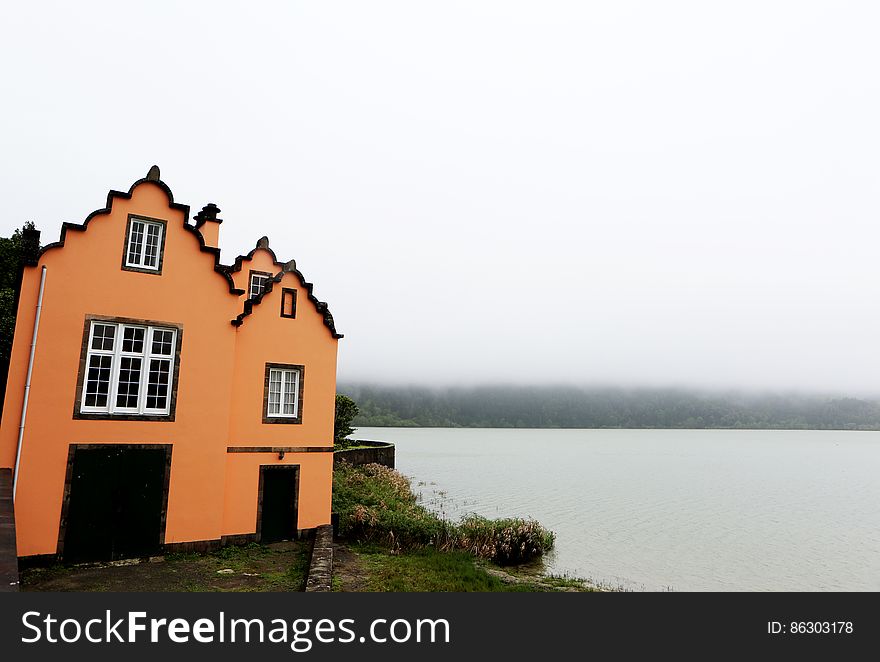 Colorful House By The Lake