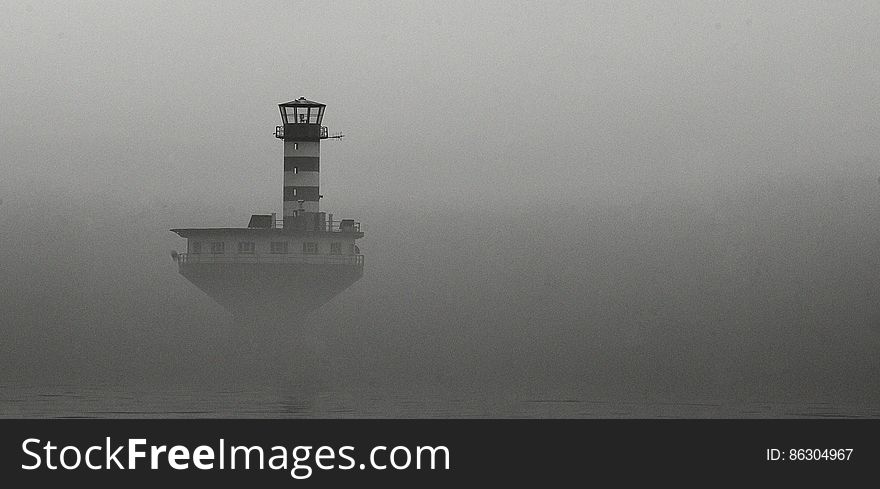 Lighthouse in the mist