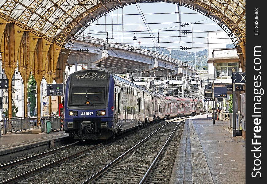 Blue and Gray Train on Station during Daytime
