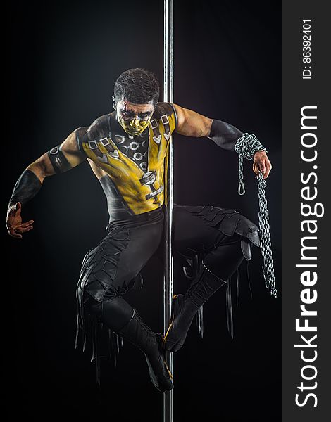 On the pole bodyart Scorpion from Mortal Kombat