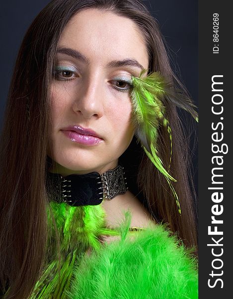 Portrait attractive young woman with green fan, vertical. Portrait attractive young woman with green fan, vertical