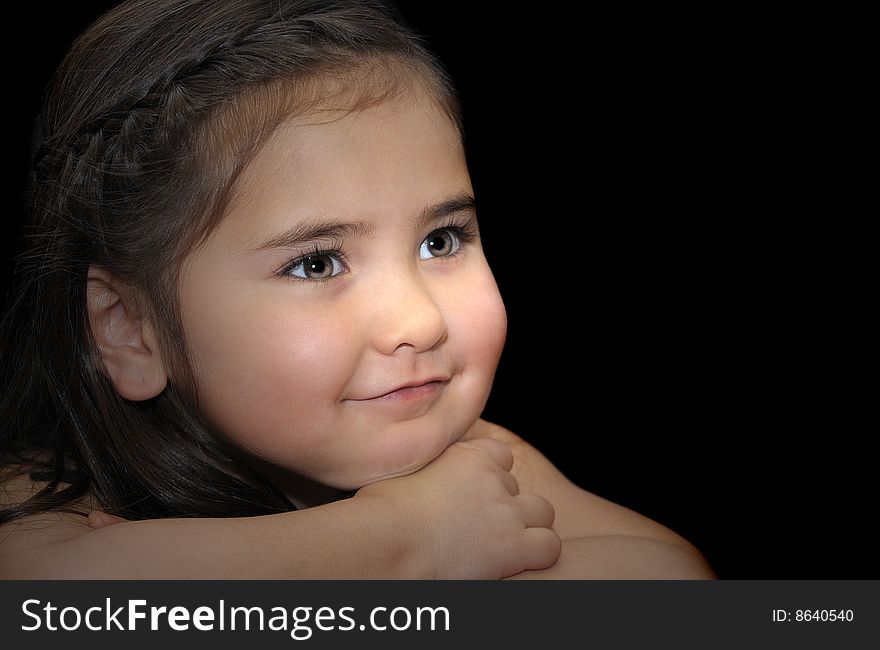 Very cute portrait of a young girl on Black. Very cute portrait of a young girl on Black