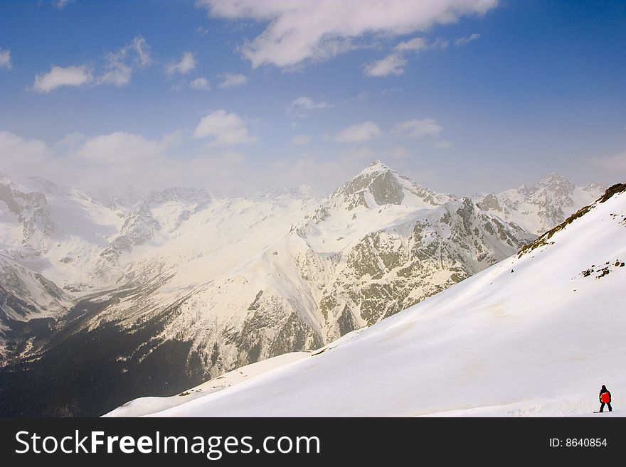 Winter Caucasus mountain, sky and clouds