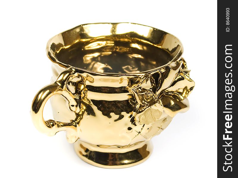 The gold coffee cup ornate on white
