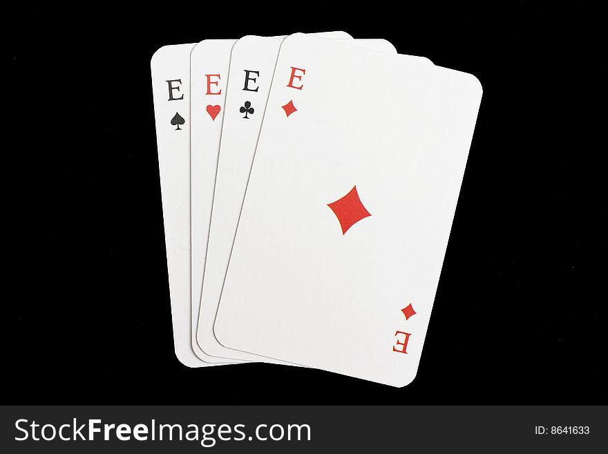 Four aces isolated on black background