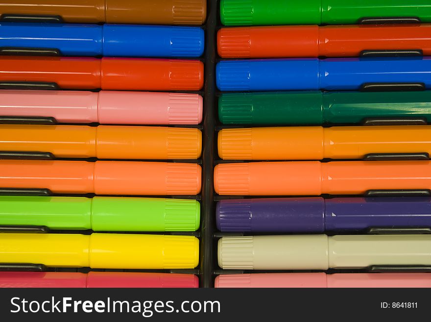 Color felt-tip pens with caps, laying in packing