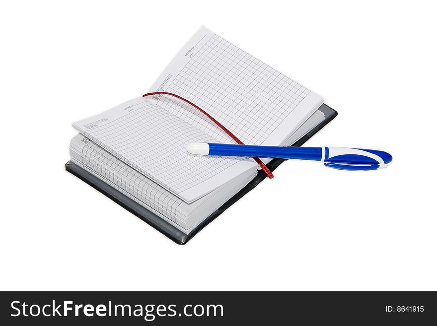 Exposed notebook and pen isolated on the white background