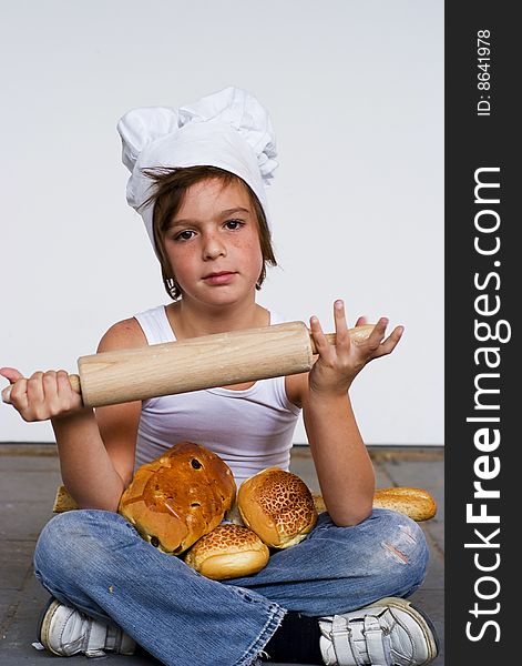 Young baker boy with bread and sandwich. Young baker boy with bread and sandwich