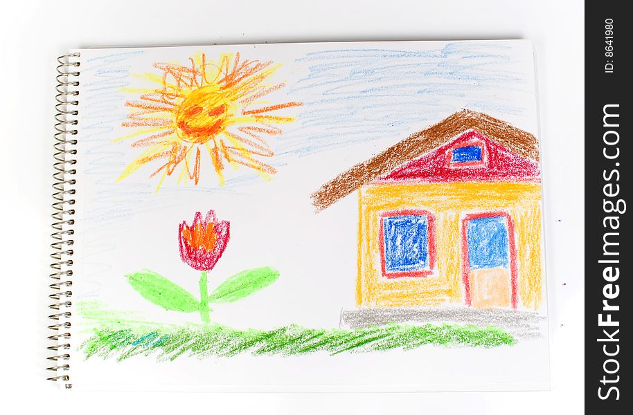 Figure the house, a green grass, a bright flower and the sun on notebook