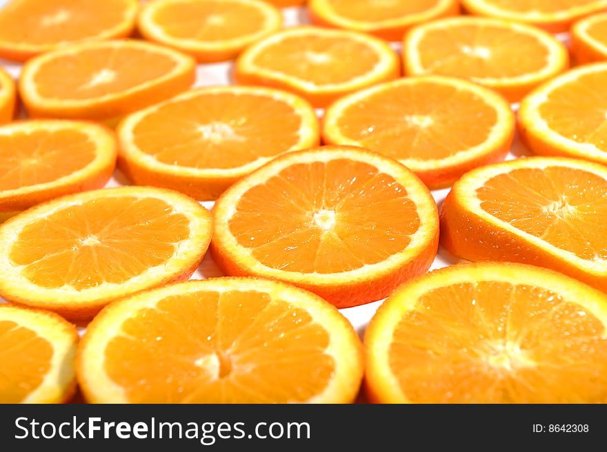 Background of orange fruits slices, selective focus. Background of orange fruits slices, selective focus
