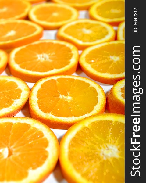 Background of orange fruits slices, selective focus. Background of orange fruits slices, selective focus