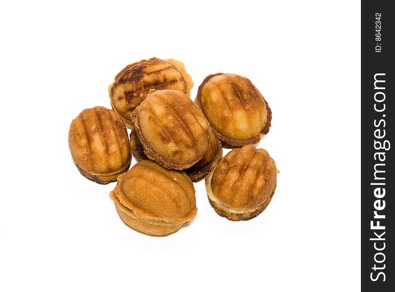 A small group of pastry is Nut on a white background