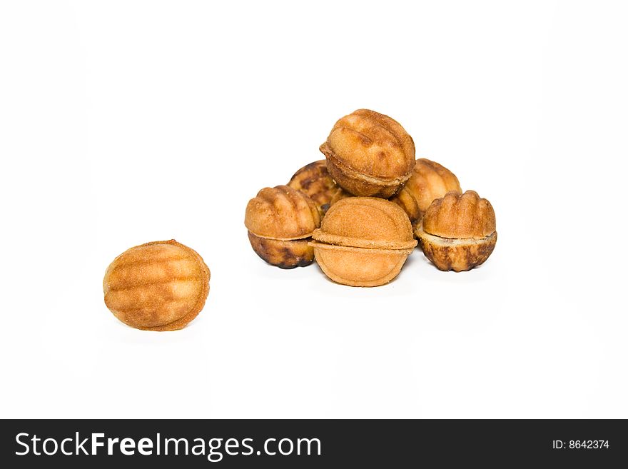 A small group and one pastry is Nut on a white background