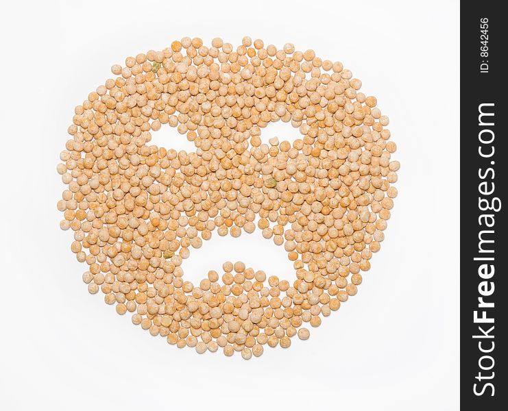 Sorrowful person from a pea on a white background
