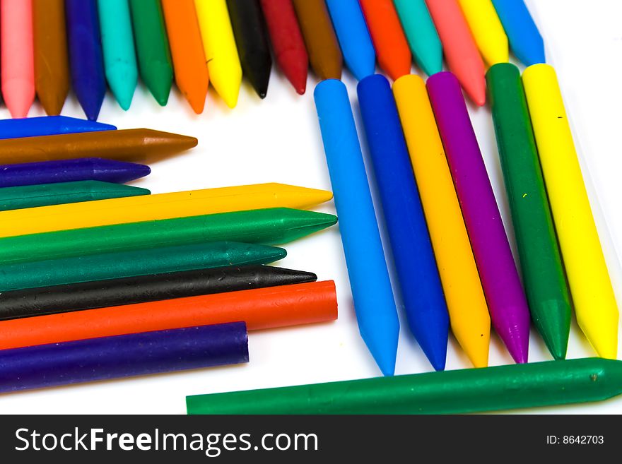 Some bright multi-coloured wax pencils for children's creativity