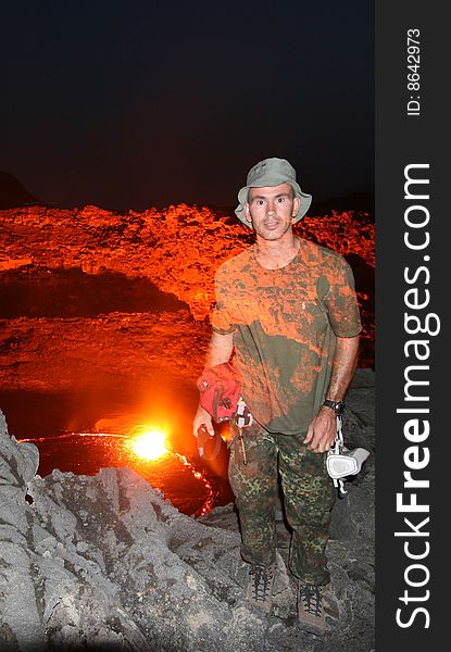 Self portrait of the photograper  in front of the Erta Ale lava lake. Self portrait of the photograper  in front of the Erta Ale lava lake