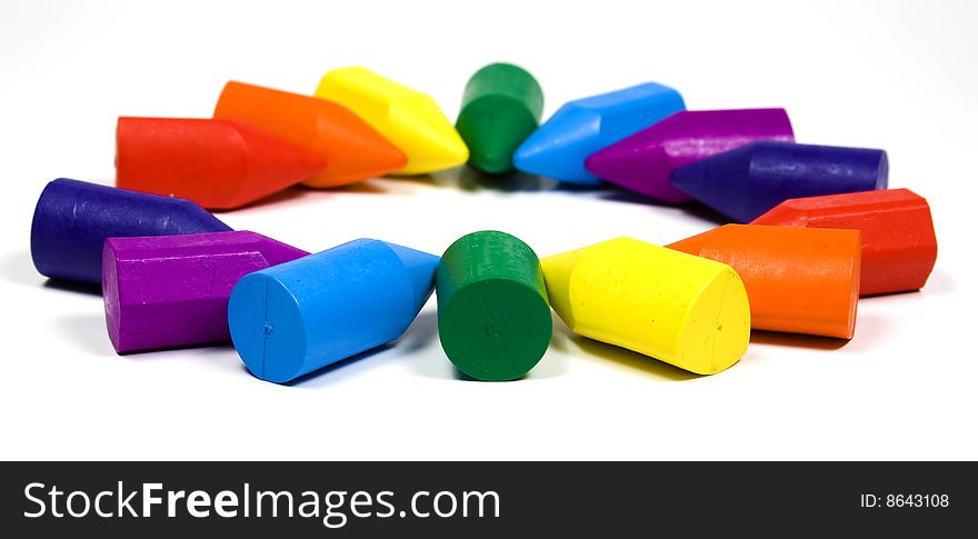 Rainbow from wax crayons in the form of two semicircles