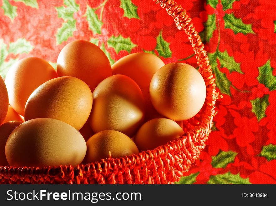 Easter concept: many simple eggs in decorative basket. Easter concept: many simple eggs in decorative basket