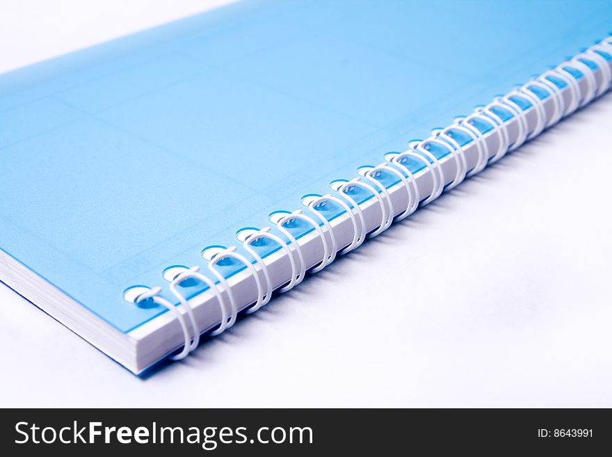 Macro view of notebook rings over white