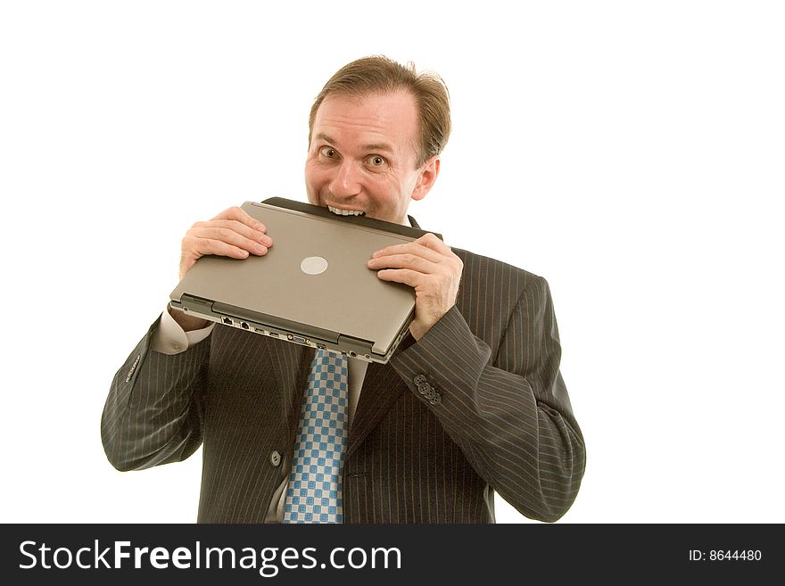 Young businessman bite off laptop