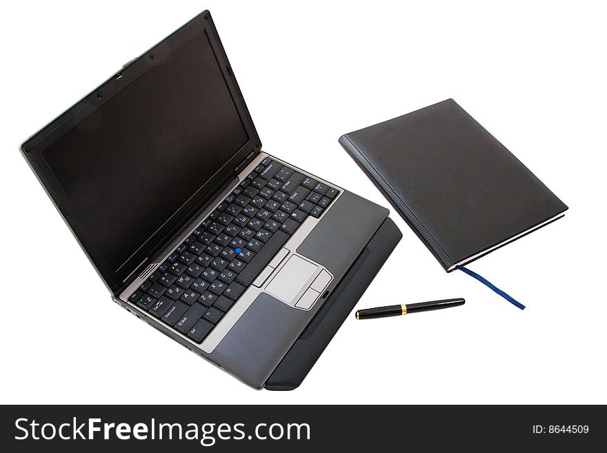 Little laptop, note and pen. Little laptop, note and pen