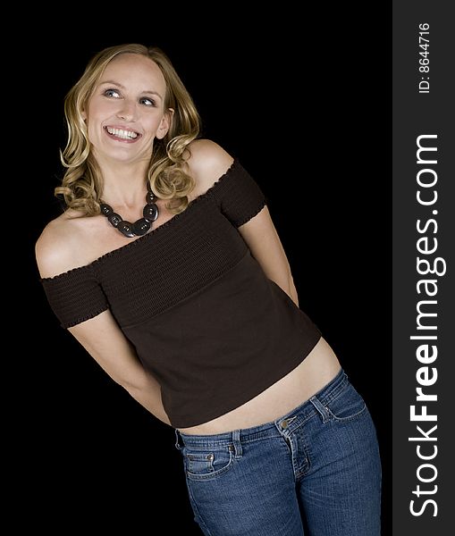 Attractive blonde woman acting silly and smiling. Attractive blonde woman acting silly and smiling.