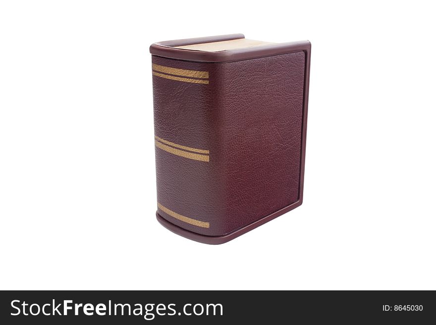 Brown book with golden stripes isolated on white