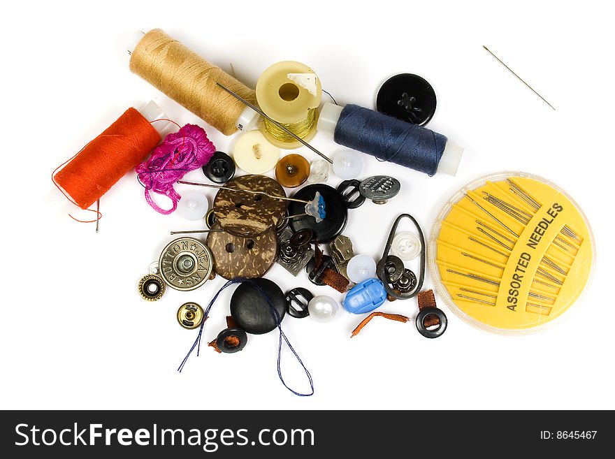 Set of buttons, needles, strings for repair of clothes
