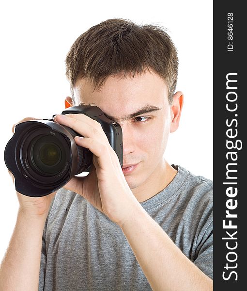 Young photographer with camera. Isolated on white background