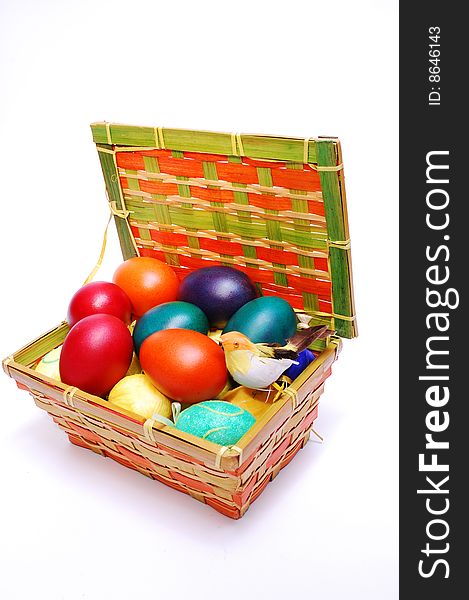 Colorful easter eggs in box isolated on white background