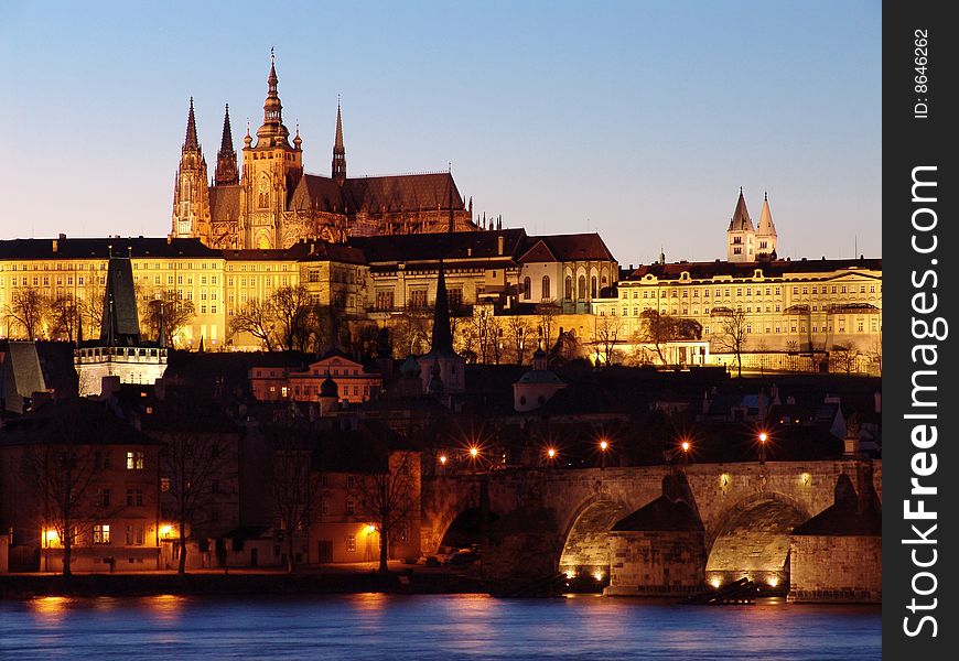 Prague gothic Castle past Sunset on Vltav