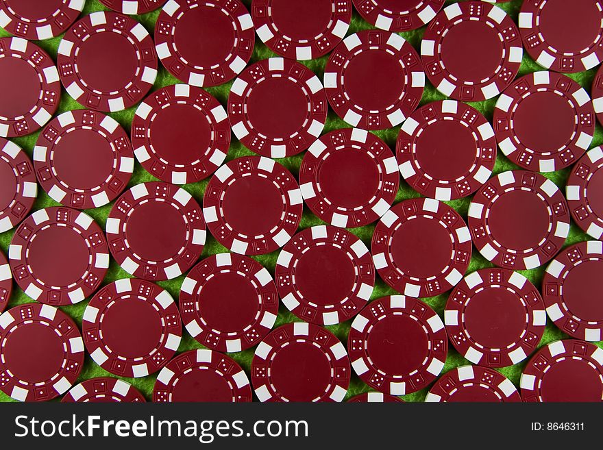 Many red poker chips background