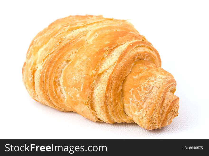 Fresh croissant isolated on a white