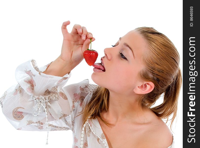 Beautiful girl with strawberry over white