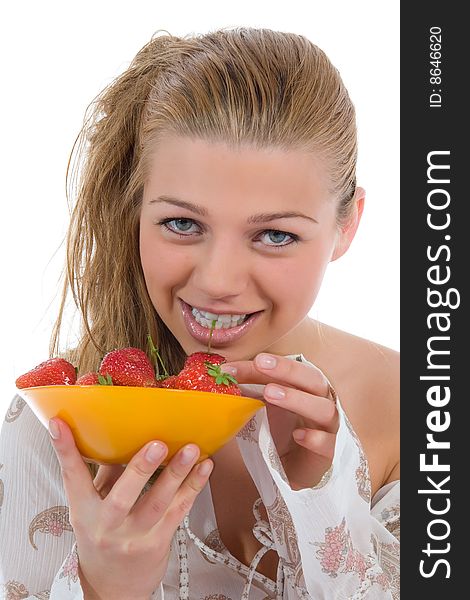 Beautiful girl with strawberry over white