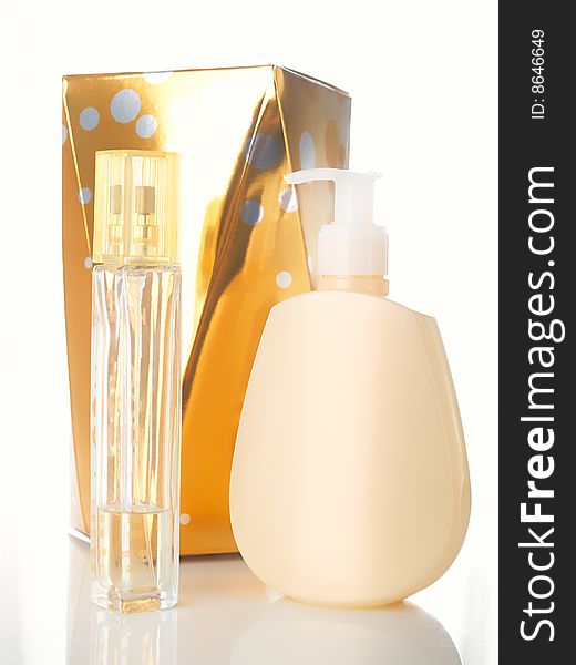 Elegant perfume bottle with reflection and box. Elegant perfume bottle with reflection and box