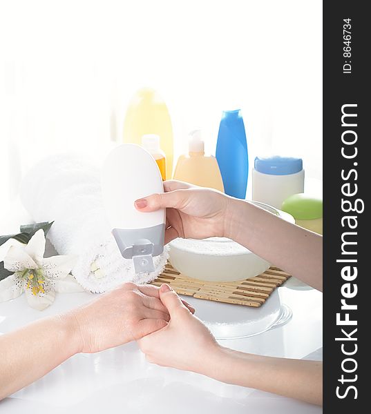 Spa process with female hands.