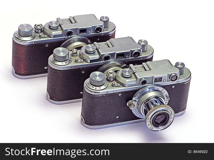 Old photo cameras on a white background