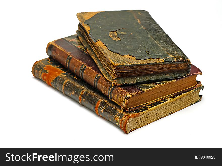 Old religious books on a white