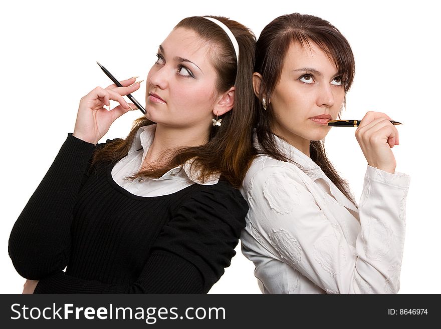 Two young businesswomens with pensils