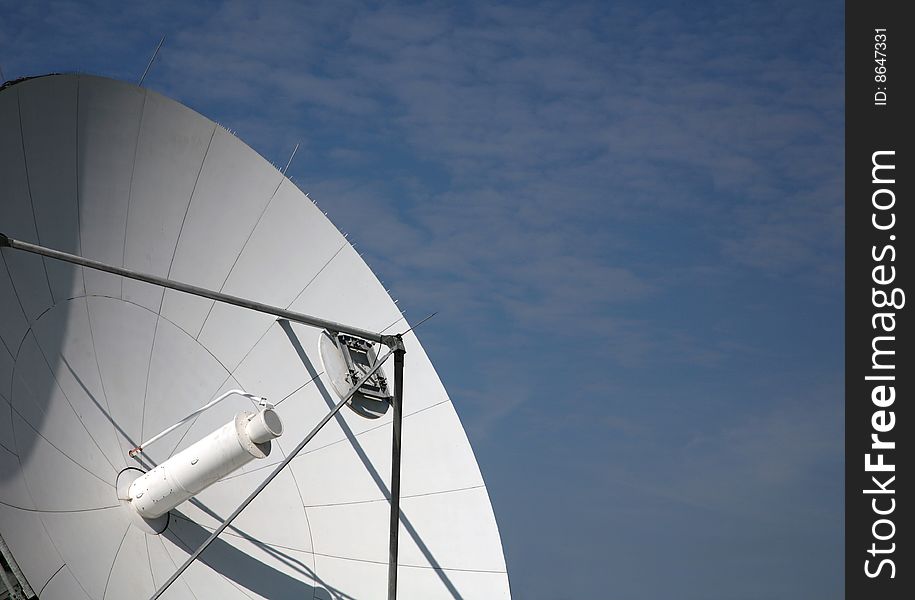 A radio telescope and blue sky, Germany